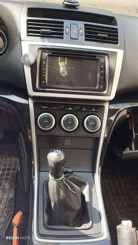 Schemat demontażu konsoli Mazda 6